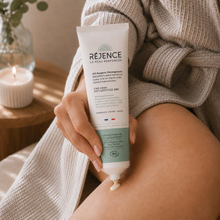 Application de la Cold cream SOS rougeurs et démangeaisons 150 mL Réjence sur une jambe.